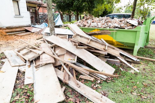 Image showing eco-friendly flat clearance team in Twickenham sorting items for recycling